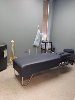 Chiropractic Alexandria VA Blue Adjustment Table