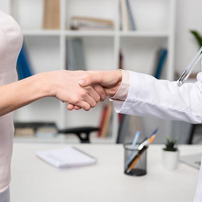 Chiropractic VA and MD Patient and Doctor Shaking Hands